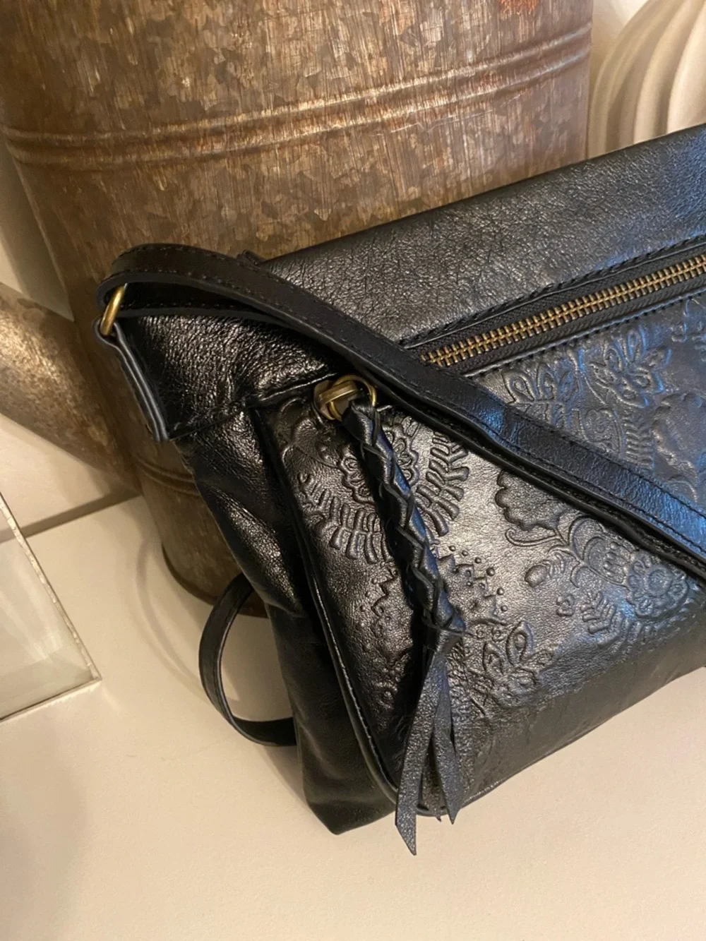The Sak Sanibel Black Leather Floral Embossed Mini Crossbody w/ Gold Hardware - Picture 2 of 11